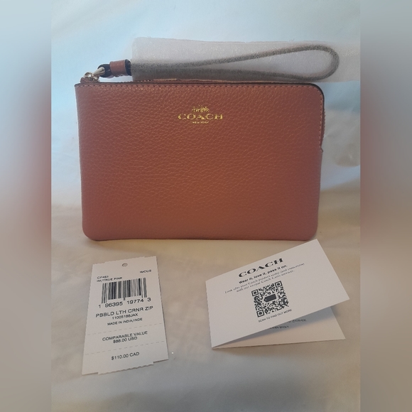 Coach Handbags - New Coach Wristlet In True Pink Color